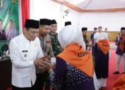 Wali Kota Weny Gaib Serahkan Bantuan Transportasi Lokal Rp 3,85 Juta per JCH Kotamobagu